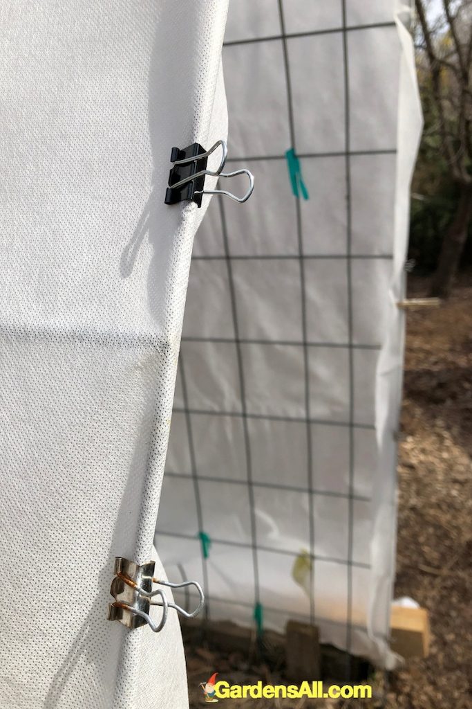 metal binder clips to secure frost covers onto cattle panels